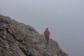 Woman trekking on mystical hiking trail leading to Mount Olympus Mytikas, Skala, Stefani in Mt Olympus National Park