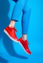 Woman fashionable red leather shoe trend concept blue style modern color