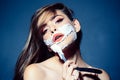 Woman with trendy makeup. girl with fashion hair. woman shaving with foam and razor blade. morning grooming and skincare