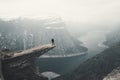 Woman On Trolltunga Troll tongue The Famous place in Norway, View On Trolltunga And Mountain Landscape, Norway