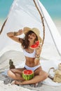 Woman on the Tropical Beach Eating Watermelon Royalty Free Stock Photo