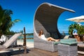 Woman on a tropical beach jetty