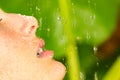 Woman in tropical shower