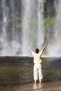 Woman and tropical waterfall Royalty Free Stock Photo