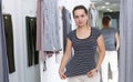Woman trying new clothes in dressing room Royalty Free Stock Photo
