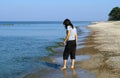 Woman trying water Royalty Free Stock Photo