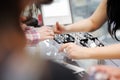 Woman trying wedding rings at a jeweller