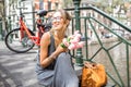 Woman with tulips in Amsterdam city Royalty Free Stock Photo