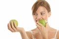 Woman with two green apples Royalty Free Stock Photo