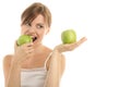 Woman with two green apples Royalty Free Stock Photo