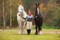 Woman with two shire horses Royalty Free Stock Photo