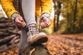 Woman tying shoelace on her hiking boot Royalty Free Stock Photo