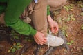 Woman tying a shoelaces outdoor