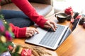 woman type on laptop at home. girl use computer during xmas. christmas holiday. new year celebration. season greetings Royalty Free Stock Photo