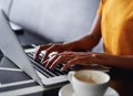 Woman typing on laptop at the cafe Royalty Free Stock Photo