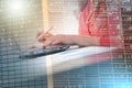 Woman typing on laptop, light effect; multiple exposure Royalty Free Stock Photo