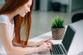 Woman typing on laptop at workplace Woman working in home office hand keyboard Royalty Free Stock Photo