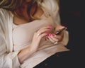 Woman typing message on her cell phone - Chat concept Royalty Free Stock Photo