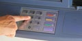 woman typing the secret code on the ATM keyboard Royalty Free Stock Photo