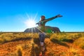 Woman at Uluru sunrise Royalty Free Stock Photo