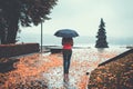 Woman with an umbrella in the park in autumn day Royalty Free Stock Photo