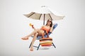 Woman under beach umbrella Royalty Free Stock Photo