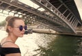 Woman under bridge in Paris, France Royalty Free Stock Photo