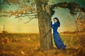 Woman under fallen tree