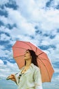 Woman under pink umbrella Royalty Free Stock Photo