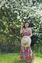 Woman under plum trees Royalty Free Stock Photo