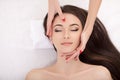 Woman under professional facial massage in beauty spa Royalty Free Stock Photo