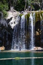 Woman under a waterfall