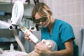 Woman undergoing laser skin treatment