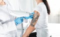 Woman undergoing laser tattoo removal procedure