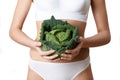 Close Up Of Woman In Underwear Holding Cabbage