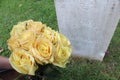 Woman at Unknown soldier`s grave with yellow flowers. Royalty Free Stock Photo