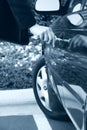 Woman unlocking car door Royalty Free Stock Photo