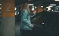 Woman unlocking her car