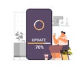 woman updating operating system update process install new software on smartphone