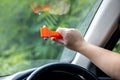 Woman use Safety Hammer and Seatbelt Cutter in Cars, break glass When emergency. In case of emergency on car safety red hammers to Royalty Free Stock Photo