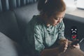 woman use smartphone give unhappy client with Sadness Emotion Face. Customer Experience dissatisfied Concept, bad service dislike Royalty Free Stock Photo