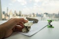 Woman use staple puller to remove staple from business document Royalty Free Stock Photo