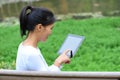 Woman use tablet outdoor Royalty Free Stock Photo
