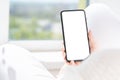 Cropped shot view of woman hands holding smart phone with blank copy space screen for text message or information content,. female Royalty Free Stock Photo