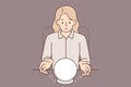 Woman uses crystal ball to predict future during seance and provide psychic services