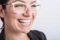 A woman uses transparent retainers to whiten teeth