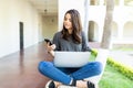 Woman Using Application To Connect Smartphone And Laptop On Rail Royalty Free Stock Photo