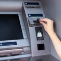 Woman using ATM Royalty Free Stock Photo