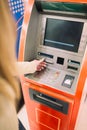 Woman using atm cash machine Royalty Free Stock Photo