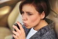 Woman using breath alcohol analyzer in the car Royalty Free Stock Photo